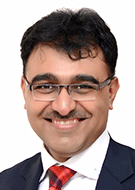 Head shot of Sameer Raniga, MD, FRCR