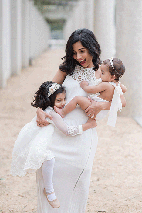 Candid photo of Beth Vettiyil MD with her children