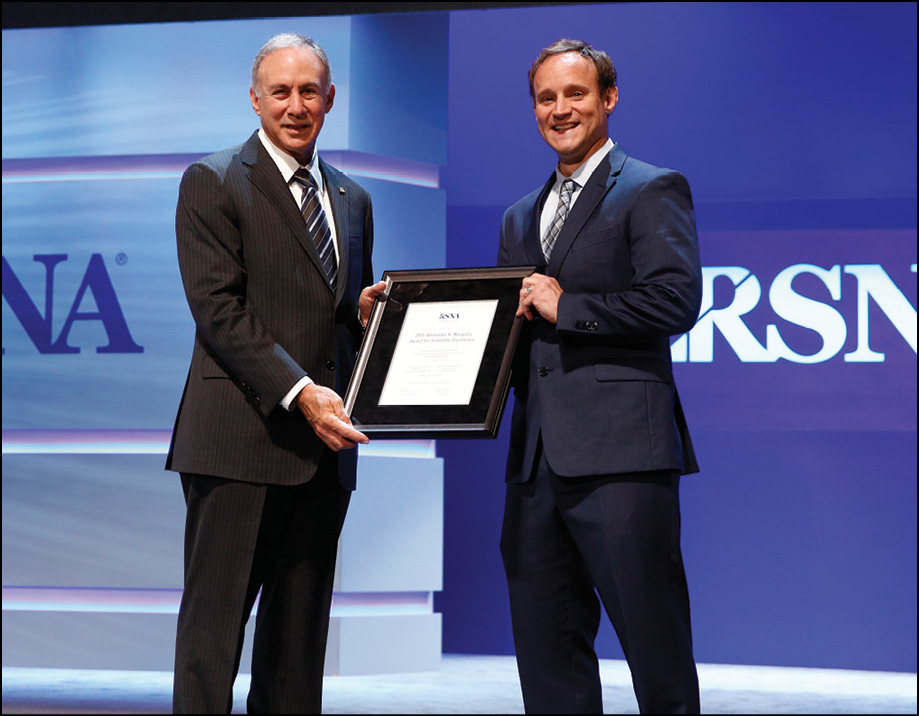 RSNA President Ronald L. Arenson, M.D., left, presents Jeffrey W. Prescott, M.D., Ph.D., with the RSNA Alexander R. Margulis Award for Scientific Excellence. RSNA President Ronald L. Arenson, M.D., left, presents Jeffrey W. Prescott, M.D., Ph.D., with the RSNA Alexander R. Margulis Award for Scientific Excellence.