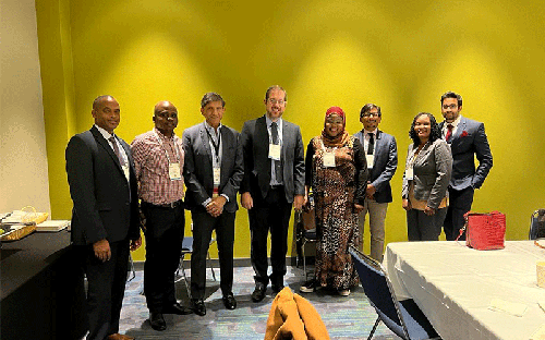 Dr. Kwikima with colleagues at RSNA 2022
