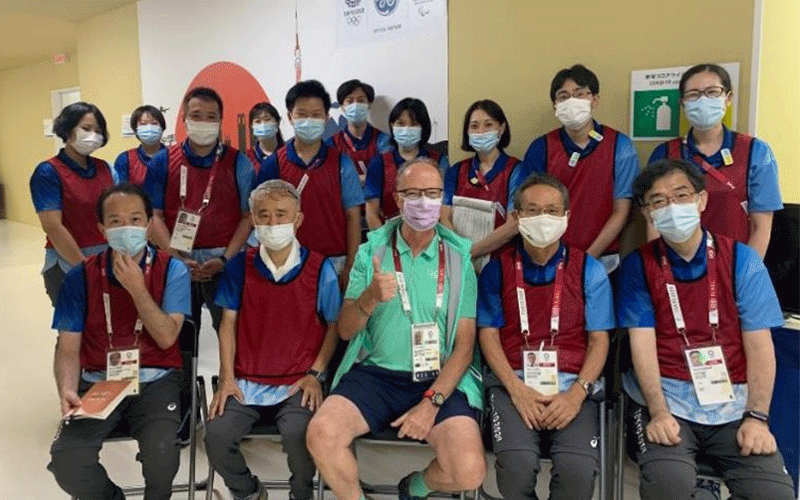 Bruce B. Forster MSc, MD, FRCPC (center) with radiologists and other medical staff during the Tokyo 2020 Olympic Summer