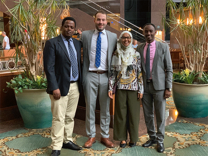 Fabian Laage Gaupp, MD, poses with colleagues at Muhimbili University of Health and Allied Sciences (MUHAD) in Tanzania