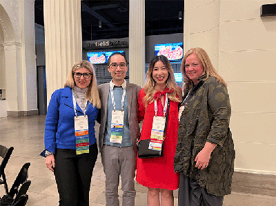 Jonathan Revels, DO, poses with Mariam Moshiri, MD, Sherry Wang, MBBS, FRANZCR, and Jennifer Weaver, MD