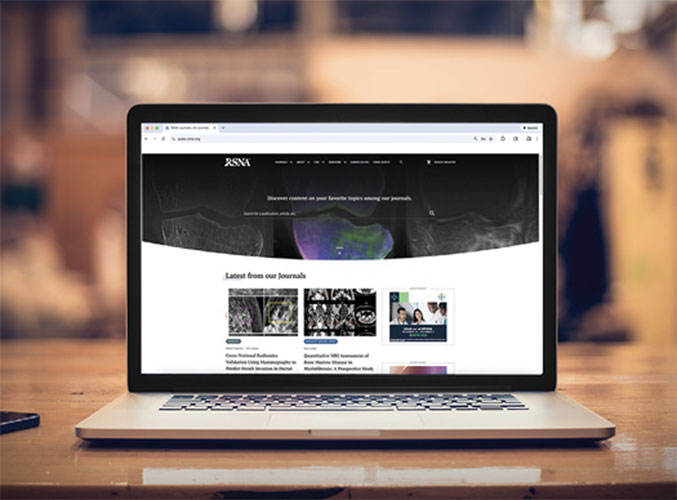 RSNA Journals homepage is displayed on a laptop screen.