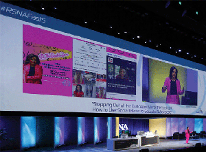 Woman onstage presenting Fast 5.