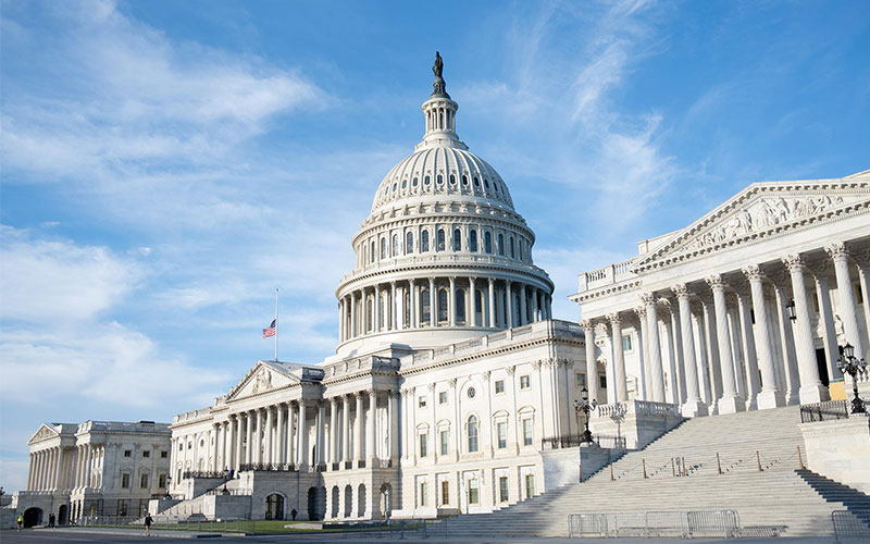 View of Capitol Hill Building with a blue sky in the background in Washington, D.C.
