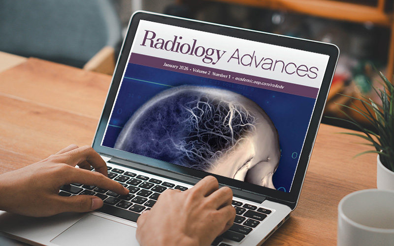 Radiology Advances journal cover on laptop concept for open access
