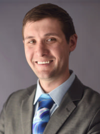 B. Dustin Pooler, M.D.